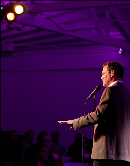David Rodwin speaking on stage